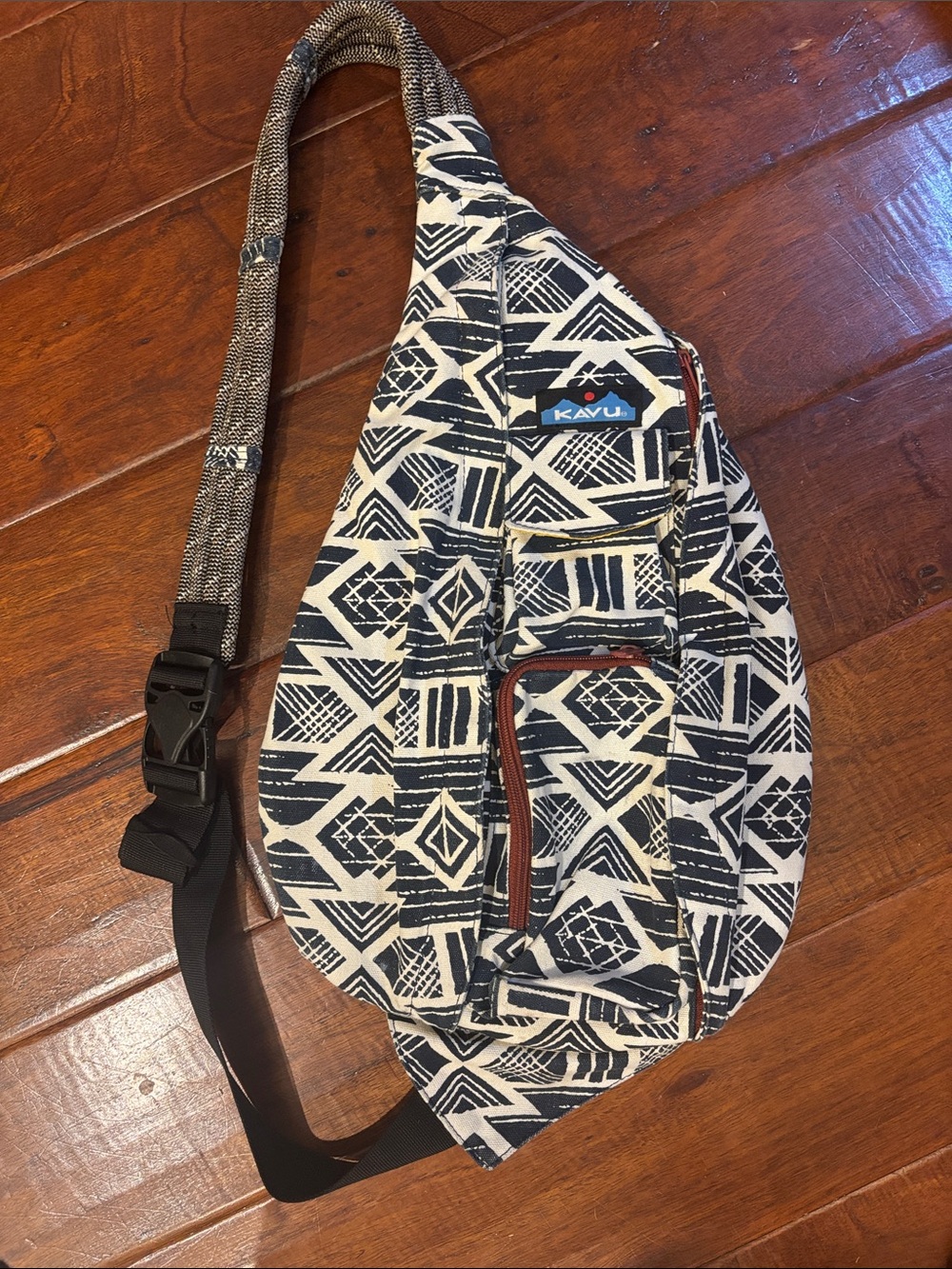 Kavu Cream & Navy Patterned Sling Bag with Yellow Interior